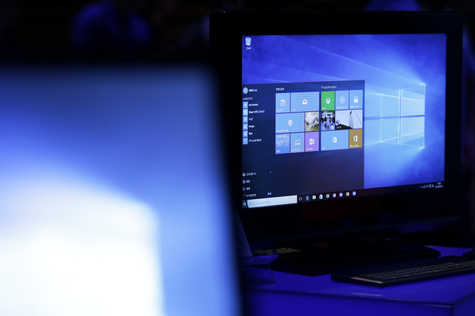 A computer running Microsoft Corp.'s Windows 10 operating system sits on display during a launch event in Tokyo, Japan, on Wednesday, July 29, 2015. The release of Microsoft's new Windows 10 operating system -- an event that in years past sparked a surge of computer buying -- will do little to ease the four-year sales slump that's been dogging the PC industry. Photographer: Kiyoshi Ota/Bloomberg via Getty Images